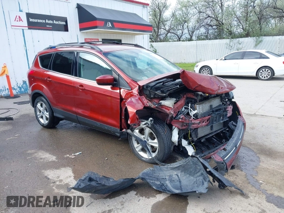 2014 Ford Escape SE z VIN 1FMCU9GX8EUB98766, wystawiony jako IAAI lot #42256143 z przebiegiem 64 074 mil mil oraz . Historia ofert i sprzedaży dostępna na DreamBid. Obrazek 1.