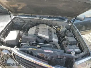 2000 Toyota Land Cruiser with VIN JT3HT05J1Y0096328, listed as a Copart auction lot 48390945 with 290,978 mi miles and Salvage Title. Bid and sale history available at carsss.com. Image 14.