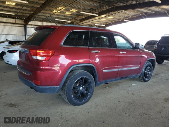 2013 Jeep Grand Cherokee Overland with VIN 1C4RJECT6DC526743, listed as a Copart auction lot 50203065 with 186,673 mi miles and Salvage Title. Bid and sale history available at DreamBid. Image 3.