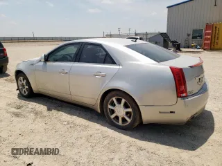 2008 Cadillac CTS RWD with VIN 1G6DF577180156692, listed as a Copart auction lot 57950645 with 221,679 mi miles and Salvage title. Bid and sale history available at DreamBid. Image 2.