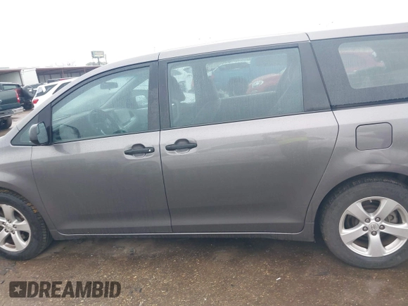 2015 Toyota Sienna L with VIN 5TDZK3DC9FS563593, listed as a IAAI auction lot 41466419 with 136,394 mi miles and . Bid and sale history available at DreamBid. Image 14.