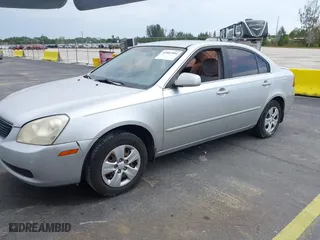 2007 Kia Optima LX with VIN KNAGE123175135348, listed as a IAAI auction lot 41887004 with 149,094 mi miles. Bid and sale history available at carsss.com. Image 2.