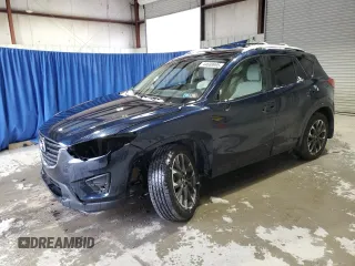 2016 Mazda CX-5 Grand Touring with VIN JM3KE4DY9G0708024, listed as a Copart auction lot 44689995 with 113,002 mi miles and Salvage Title. Bid and sale history available at DreamBid. Image 1.