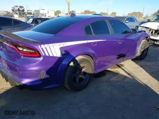 2023 Dodge Charger Scat Pack Widebody with VIN 2C3CDXGJ2PH638480, listed as a IAAI auction lot 41387362 with 8,363 mi miles. Bid and sale history available at carsss.com. Image 4.