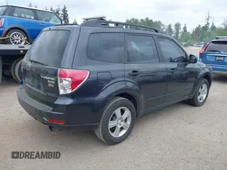 2012 Subaru Forester X with VIN JF2SHABC7CH404340, listed as a IAAI auction lot 42256177 with 163,828 mi miles and . Bid and sale history available at DreamBid. Image 4.