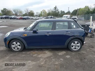 2015 MINI Hardtop 4 Door z VIN WMWXS5C54FT828442, wystawiony jako IAAI lot #42036692 z przebiegiem 88 224 mil mil oraz . Historia ofert i sprzedaży dostępna na DreamBid. Obrazek 15.
