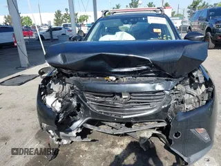2016 Mazda CX-3 Grand Touring z VIN JM1DKBD73G0111148, wystawiony jako IAAI lot #42260375 z przebiegiem Nie podano mil oraz . Historia ofert i sprzedaży dostępna na DreamBid. Obrazek 11.