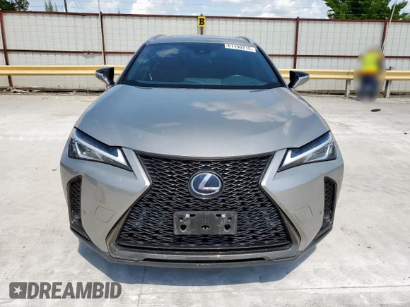2022 Lexus UX 250h F Sport z VIN JTHR9JBH1N2057419, wystawiony jako Copart lot #61190715 z przebiegiem 60 401 mil mil oraz Szkoda całkowita • Salvage title. Historia ofert i sprzedaży dostępna na DreamBid. Obrazek 7.