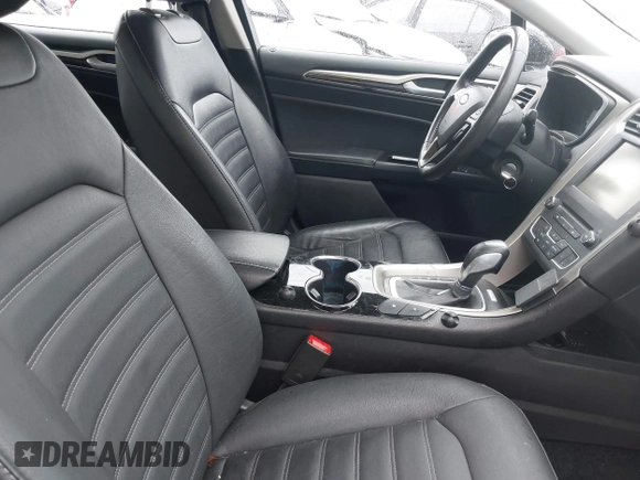 2016 Ford Fusion Energi SE Luxury with VIN 3FA6P0PU7GR293099, listed as a IAAI auction lot 42079873 with 194,755 mi miles. Bid and sale history available at carsss.com. Image 5.
