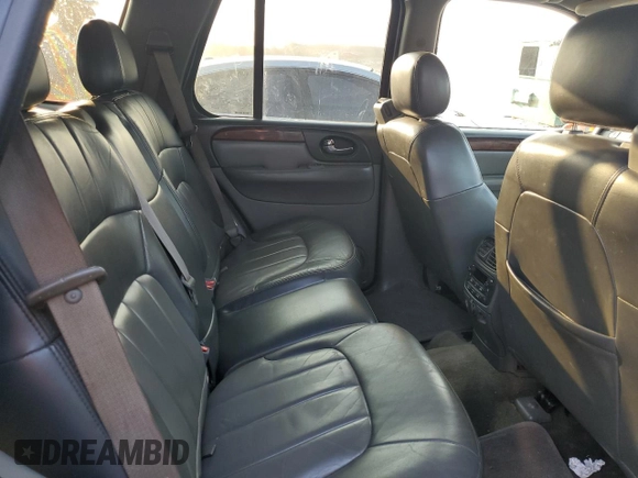 2004 GMC Envoy SLT with VIN 1GKDT13S942407244, listed as a Copart auction lot 70995064 with 162,676 mi miles and Salvage Title. Bid and sale history available at carsss.com. Image 10.