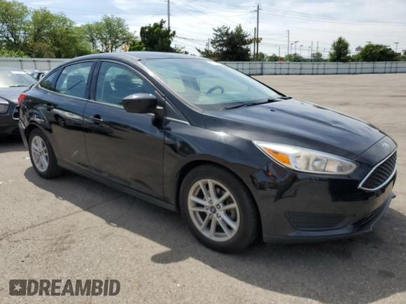 2018 Ford Focus SE z VIN 1FADP3F2XJL276652, wystawiony jako Copart lot #57499965 z przebiegiem 112 388 mil mil oraz Szkoda całkowita • Salvage title. Historia ofert i sprzedaży dostępna na DreamBid. Obrazek 4.
