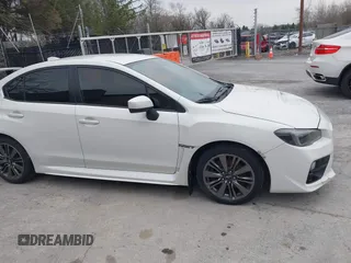 2015 Subaru WRX with VIN JF1VA1A67F9819707, listed as a IAAI auction lot 42021831 with 104,706 mi miles. Bid and sale history available at carsss.com. Image 13.