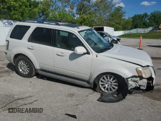2010 Mercury Mariner Premier с VIN 4M2CN8HG9AKJ17395, выставлен на аукционе Copart как лот 56852285 с пробегом 159 695 миль миль и Списание • Salvage title. История ставок и продаж доступна на DreamBid. Изображение 4.