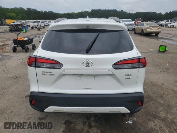 2023 Toyota Corolla Cross XLE with VIN 7MUDAABG3PV044005, listed as a Copart auction lot 54955225 with 50,712 mi miles and Salvage title. Bid and sale history available at DreamBid. Image 6.