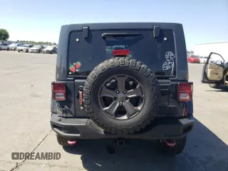 2018 Jeep Wrangler Unlimited Rubicon Recon с VIN 1C4BJWFG4JL806758, выставлен на аукционе Copart как лот 62555625 с пробегом 142 527 миль миль и Списание • Salvage title. История ставок и продаж доступна на DreamBid. Изображение 6.
