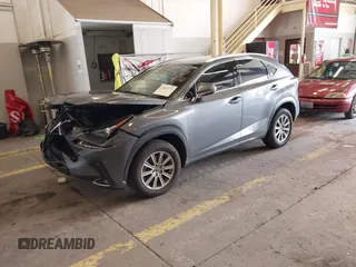 2021 Lexus NX with VIN JTJDARDZ5M2262793, listed as a IAAI auction lot 41831374 with 26,714 mi miles. Bid and sale history available at carsss.com. Image 16.
