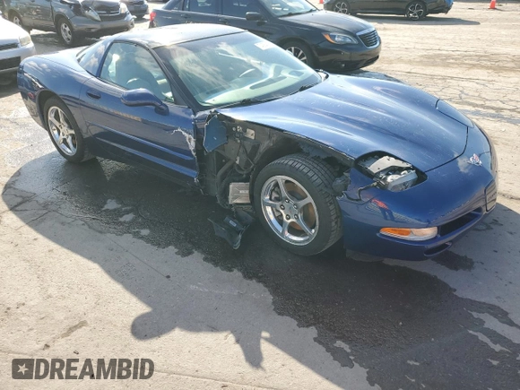 2004 Chevrolet Corvette with VIN 1G1YY22G145132963, listed as a Copart auction lot 74264184 with 74,077 mi miles and Salvage Title. Bid and sale history available at carsss.com. Image 4.