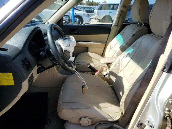 2006 Subaru Forester 2.5 X with VIN JF1SG63686H746381, listed as a Copart auction lot 77260714 with 208,580 mi miles and Salvage Title. Bid and sale history available at carsss.com. Image 7.