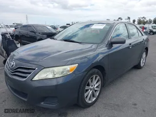2010 Toyota Camry with VIN 4T1BF3EK5AU068156, listed as a IAAI auction lot 42035585 with 221,889 mi miles. Bid and sale history available at carsss.com. Image 2.