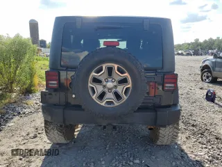 2010 Jeep Wrangler Rubicon with VIN 1J4BA6D10AL109001, listed as a Copart auction lot 69453954 with 137,821 mi miles and Salvage title. Bid and sale history available at DreamBid. Image 6.
