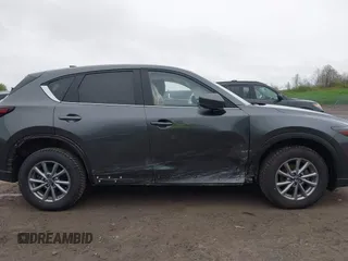 2023 Mazda CX-5 S Select with VIN JM3KFBBM4P0228412, listed as a IAAI auction lot 42194856 with 31,708 mi miles and . Bid and sale history available at carsss.com. Image 13.