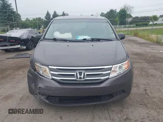 2011 Honda Odyssey EX-L with VIN 5FNRL5H64BB029087, listed as a IAAI auction lot 42508764 with 214,705 mi miles and . Bid and sale history available at DreamBid. Image 12.