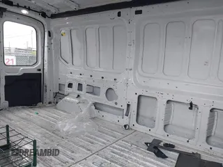 2020 Ford Transit Cargo with VIN 1FTBR1C84LKB72904, listed as a IAAI auction lot 42615080 with 137,235 mi miles and . Bid and sale history available at DreamBid. Image 8.