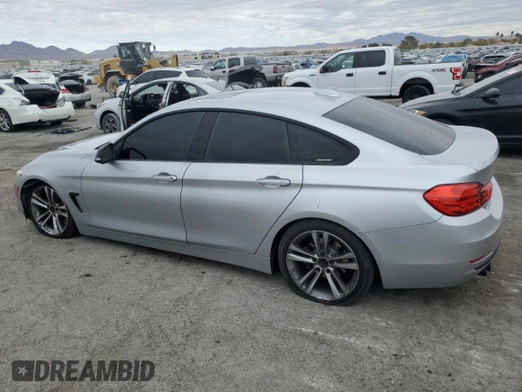 2015 BMW 4 Series 428i with VIN WBA4A9C54FGL85179, listed as a Copart auction lot 82369104 with 118,189 mi miles and Salvage title. Bid and sale history available at DreamBid. Image 2.