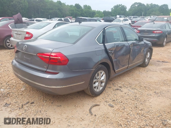 2016 Volkswagen Passat S with VIN 1VWAT7A30GC059925, listed as a IAAI auction lot 42291868 with 74,839 mi miles and . Bid and sale history available at DreamBid. Image 4.