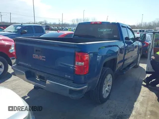 2019 GMC Sierra 1500 SLE z VIN 2GTV2MEC5K1102900, wystawiony jako IAAI lot #41996612 z przebiegiem 69 502 mil mil oraz . Historia ofert i sprzedaży dostępna na DreamBid. Obrazek 4.