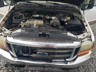 1999 Ford F-350 XL z VIN 1FTWW32F3XEA00728, wystawiony jako Copart lot #58577255 z przebiegiem 461 795 mil mil oraz Szkoda całkowita • Salvage title. Historia ofert i sprzedaży dostępna na DreamBid. Obrazek 11.