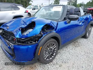 2025 MINI Convertible with VIN WMW23GX01S2X08664, listed as a IAAI auction lot 42506008 with 1,641 mi miles and . Bid and sale history available at DreamBid. Image 6.