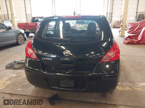 2009 Nissan Versa 1.8 S with VIN 3N1BC13E39L415491, listed as a IAAI auction lot 41614914 with 104,795 mi miles. Bid and sale history available at carsss.com. Image 16.