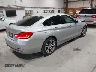 2016 BMW 4 Series 428i xDrive with VIN WBA4C9C5XGG138843, listed as a IAAI auction lot 41747358 with 63,804 mi miles and . Bid and sale history available at DreamBid. Image 4.