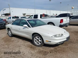 1996 Oldsmobile Aurora with VIN 1G3GR62C1T4121552, listed as a IAAI auction lot 40766504 with 75,434 mi miles and . Bid and sale history available at DreamBid. Image 1.