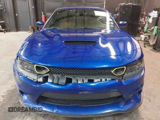 2022 Dodge Charger R/T with VIN 2C3CDXCT9NH127952, listed as a IAAI auction lot 42020401 with 55,483 mi miles and . Bid and sale history available at carsss.com. Image 13.