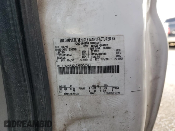 1999 Ford F-250 with VIN 1FDNF20L3XED36521, listed as a Copart auction lot 79300994 with 253,493 mi miles and Salvage title. Bid and sale history available at DreamBid. Image 12.