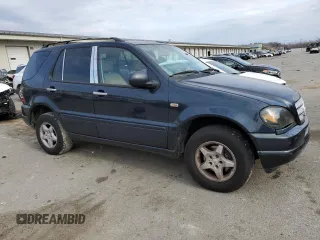 2001 Mercedes-Benz M-Class with VIN 4JGAB54E61A276417, listed as a Copart auction lot 82878094 with 205,577 mi miles and Salvage Title. Bid and sale history available at carsss.com. Image 4.
