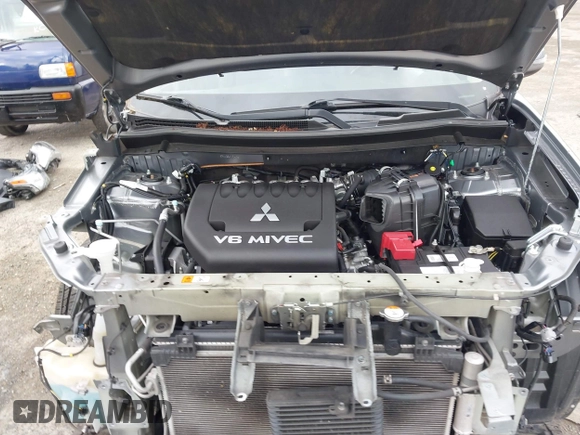 2014 Mitsubishi Outlander GT with VIN JA4JZ4AX9EZ017406, listed as a IAAI auction lot 42291696 with 107,680 mi miles and . Bid and sale history available at DreamBid. Image 10.