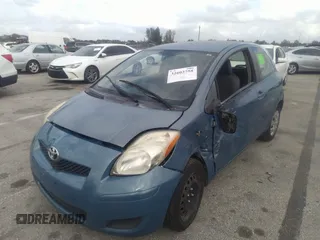 2010 Toyota Yaris with VIN JTDJT4K39A5295243, listed as a IAAI auction lot 41784428 with 92,354 mi miles. Bid and sale history available at carsss.com. Image 6.