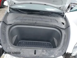 2023 Tesla Model Y Long Range z VIN 7SAYGDEE4PF621640, wystawiony jako IAAI lot #41796502 z przebiegiem 68 484 mil mil oraz . Historia ofert i sprzedaży dostępna na DreamBid. Obrazek 10.
