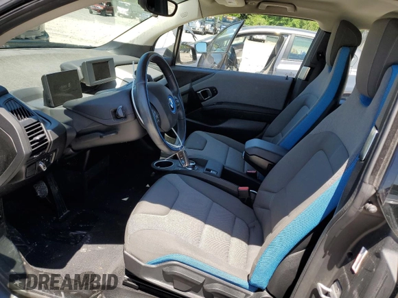 2017 BMW i3 z VIN WBY1Z8C38HV891344, wystawiony jako Copart lot #57782835 z przebiegiem 51 038 mil mil oraz Szkody całkowita. Historia ofert i sprzedaży dostępna na DreamBid. Obrazek 7.