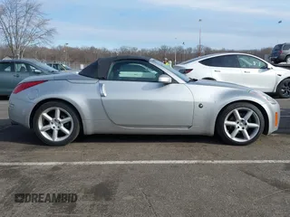 2005 Nissan 350Z Touring z VIN JN1AZ36A05M755776, wystawiony jako IAAI lot #41509506 z przebiegiem 79 148 mil mil oraz . Historia ofert i sprzedaży dostępna na DreamBid. Obrazek 13.