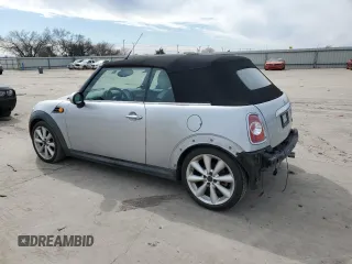 2011 MINI Convertible with VIN WMWZN3C53BTZ89332, listed as a Copart auction lot 45945515 with 25,809 mi miles and Salvage title. Bid and sale history available at DreamBid. Image 2.