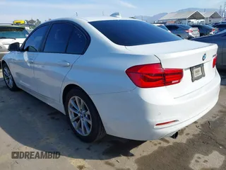 2016 BMW 3 Series 320i with VIN WBA8A9C59GK615704, listed as a IAAI auction lot 41431347 with 76,827 mi miles. Bid and sale history available at carsss.com. Image 3.