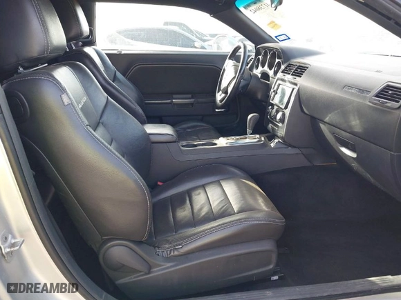 2012 Dodge Challenger SXT Plus with VIN 2C3CDYAG9CH104972, listed as a IAAI auction lot 41738042 with 148,794 mi miles. Bid and sale history available at carsss.com. Image 5.