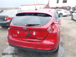 2015 Ford Focus Titanium with VIN 1FADP3N23FL248880, listed as a IAAI auction lot 41474936 with 86,245 mi miles. Bid and sale history available at carsss.com. Image 6.