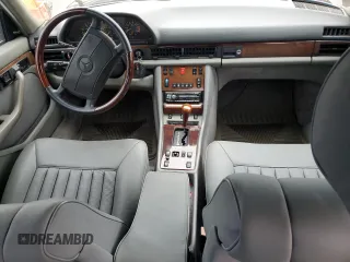 1987 Mercedes-Benz 560 with VIN WDBCA39D7HA322057, listed as a Copart auction lot 83717904 with 246,060 mi miles and Clean Title. Bid and sale history available at DreamBid. Image 8.