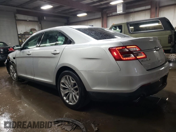 2015 Ford Taurus Limited with VIN 1FAHP2F87FG118723, listed as a Copart auction lot 85486104 with 156,853 mi miles and Salvage Title. Bid and sale history available at DreamBid. Image 2.