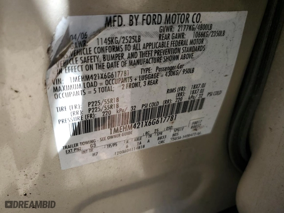 2006 Mercury Montego Premier with VIN 1MEHM421X6G617781, listed as a Copart auction lot 74932874 with 111,105 mi miles and Salvage Title. Bid and sale history available at carsss.com. Image 12.
